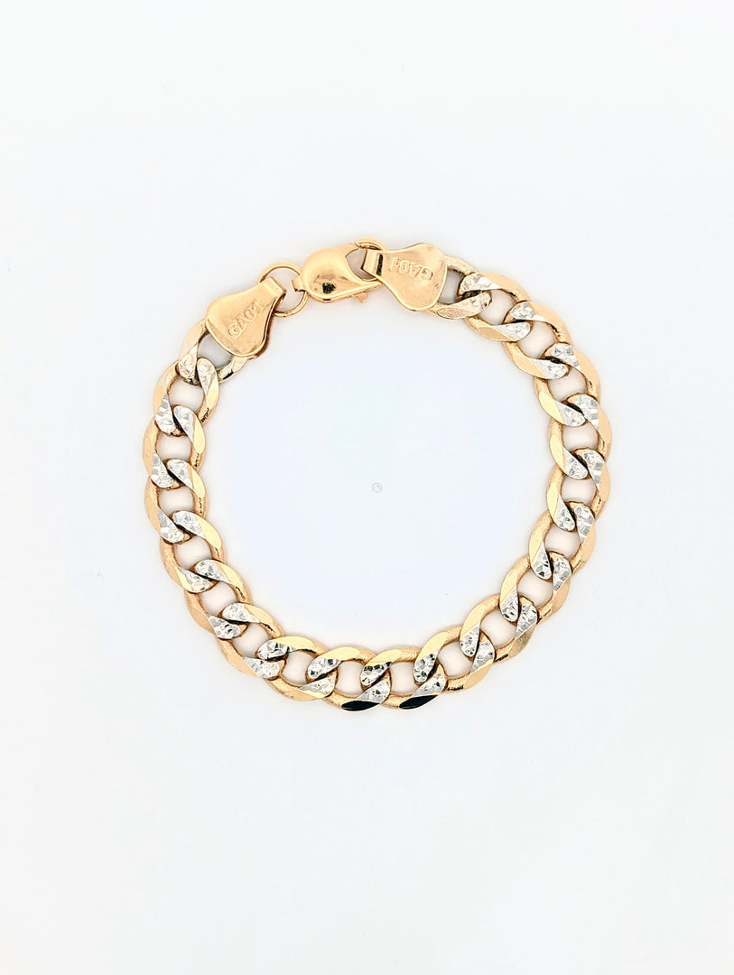 10k yellow gold flat curb link bracelet with white gold diamond cuts. 8 Inch 10mm
